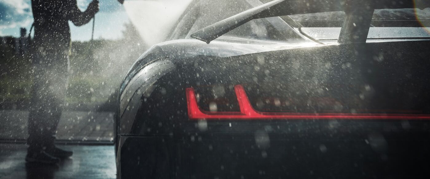 Rinsing down a taillight by hand